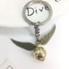 LLAVERO SNITCH DORADA1