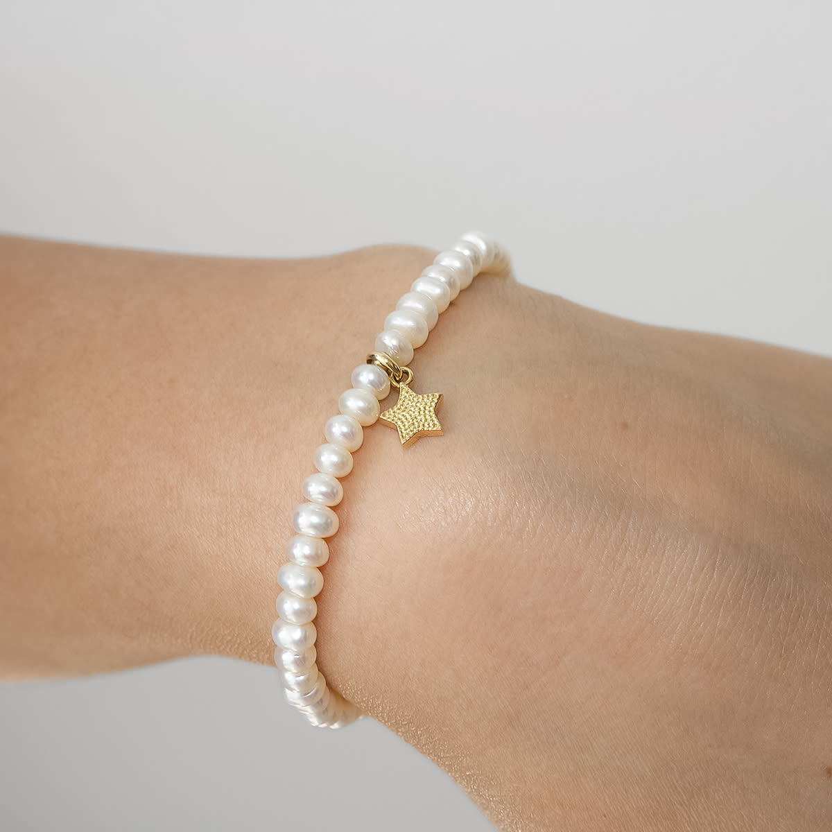 PULSERA PERLITA DONAS DE RIO Y DIJE ESTRELLITA TEXT ORO 18KT PULSERA PERLITA DONAS DE RIO Y DIJE ESTRELLITA TEXT ORO 18KT
