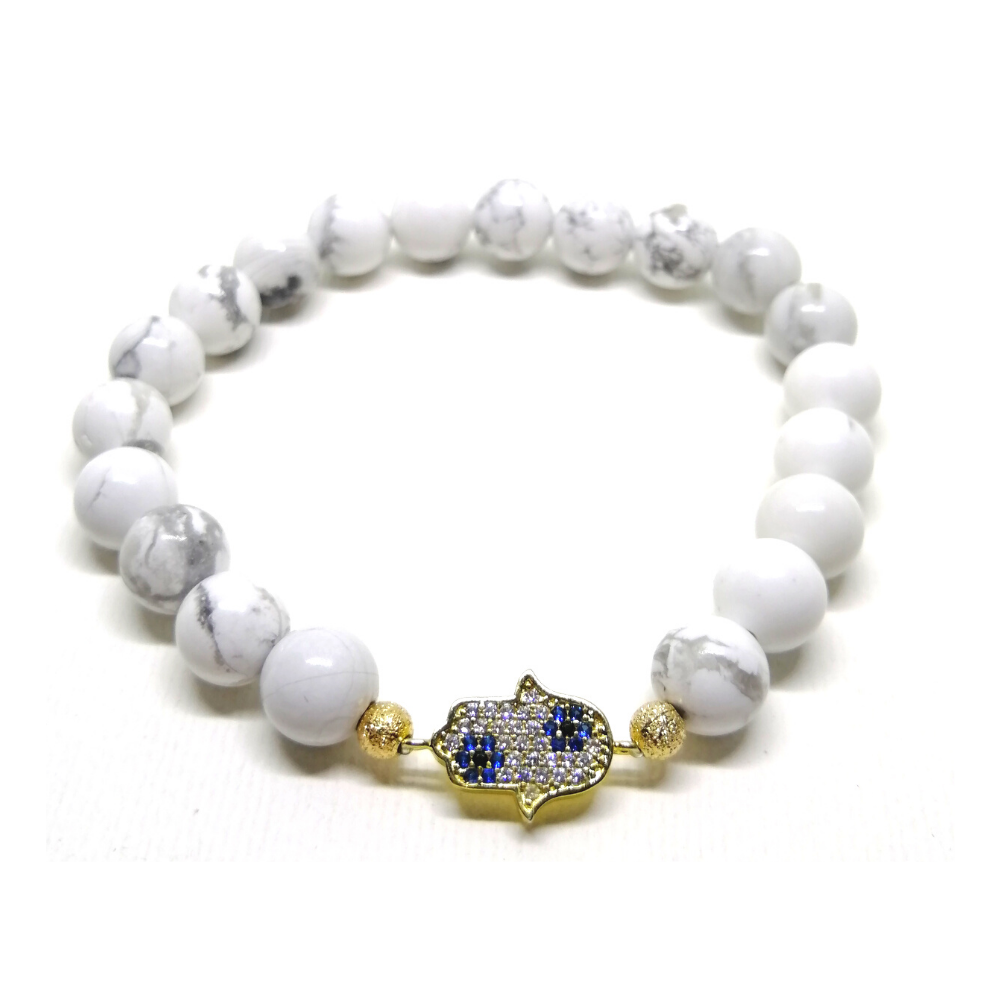 Pulsera Ariana Howlita con dije Hamsa 2 Dorada Pulsera Ariana Howlita con dije Hamsa 2 Dorada