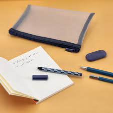SET ESTUCHE MALLA CON LIBRETA Y ACCESORIOS