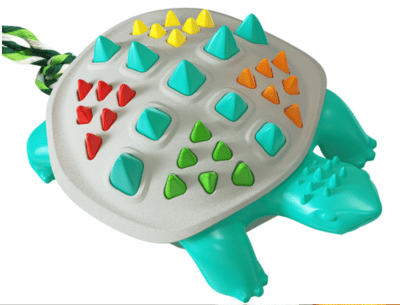 JUGUETE TORTUGA CON CUERDA-TURQUEZA/BLANCO