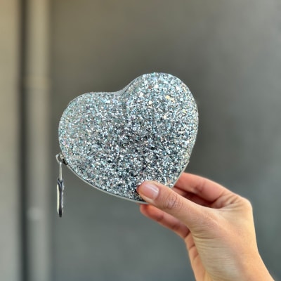 Monedero Coach Corazon plateado glitter