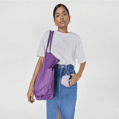 Porta bolsa Tous Colgante malva con bolsa interior1