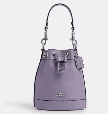 Cartera Coach bombonera Lila pequeña1