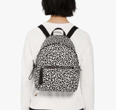 Mochila Kate Spade chelsea Mediana genero leopardo blanco y negro1