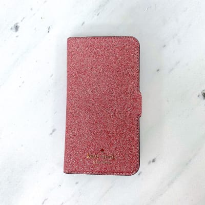 Carcasa Kate Spade con tapa glitter rosado