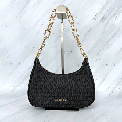 Cartera Michael Kors crossbody Cora Pouchette monograma negro cierre dorado1