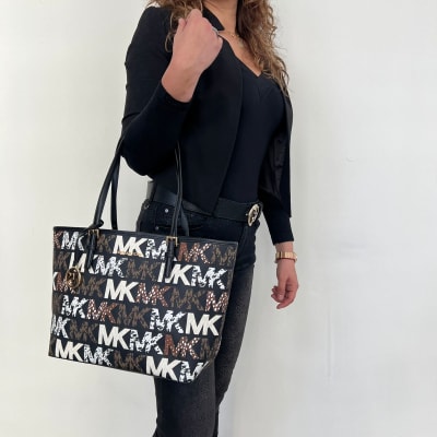 Cartera Michael Kors Tote Carryall Monograma letras animal print1