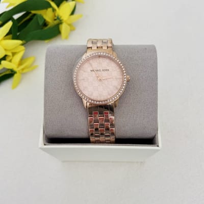 Reloj Michael Kors eslabones pequeños rose gold1