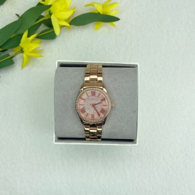 Reloj mujer Michael Kors correa metalica fondo circulo circones numeros romanos rose gold1