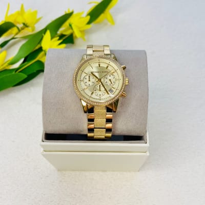 Reloj mujer Michael Kors correa metalica con 3 relojes dentro dorado con glitter1
