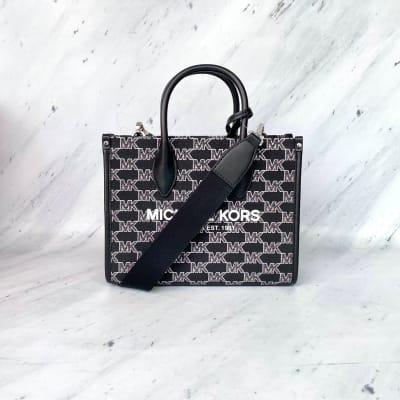 Cartera Michael Kors Mirella Small Negro monograma letras plateadas1