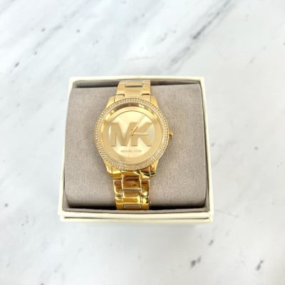 Reloj mujer Michael Kors correa metalica dorado circunferencia circones y fondo MK1