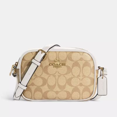 Cartera Coach Crossbody Ovalada pequeña monograma beige1