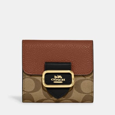 Billetera Coach pequeña broche cafe moro con tapa camel1