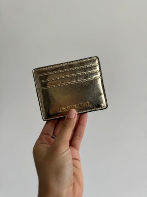 Tarjetero Michael Kors Dorado1