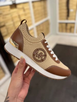Zapatillas Michael Kors Jenkins de tejido elastico de dos tonos Nude