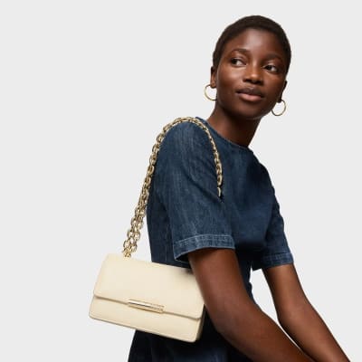 Cartera Tous Audree bandolera de cuero Beige detalles en dorado