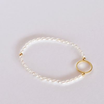 PULSERA ELASTICADA CON PERLA DE RÍO CÍRCULO CALADO1