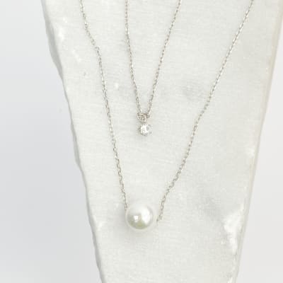 COLLAR DOBLE PERLA/PUNTO LUZ3