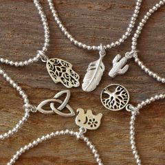 PULSERA ELASTICADA DE BOLITAS Y FIGURAS