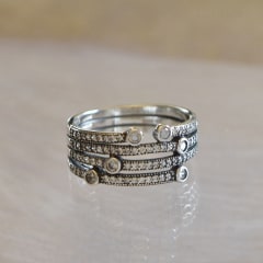 ANILLO CUATRO CINTILLOS