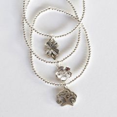 PULSERA ELASTICADA FLOR, ÁRBOL DE LA VIDA O TRÉBOL