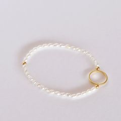 PULSERA ELASTICADA CON PERLA DE RÍO CÍRCULO CALADO
