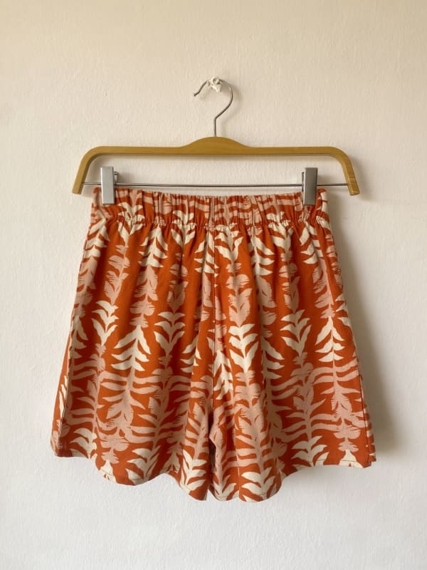 Falda short Barbados print lacre