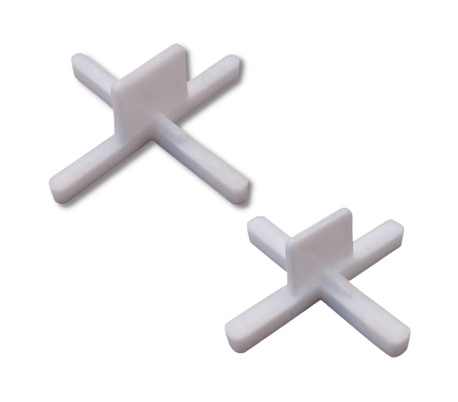 CRUCETA 1MM NIVELADOR C/TOMADOR PLANO 100 UND2