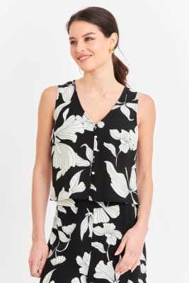 BLUSA SIN MANGAS NEGRA CON FLORES BLANCAS1