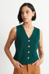 GILLET CON DRAPEADO LATERAL