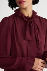 BLUSA VUELOS MANGA LARGA NICOPOLY