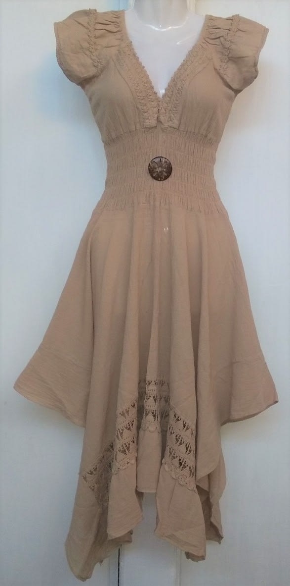 Vestido beige en punta1