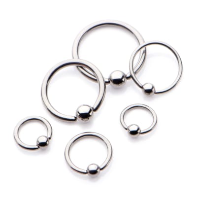 CAPTIVE RING ACERO 