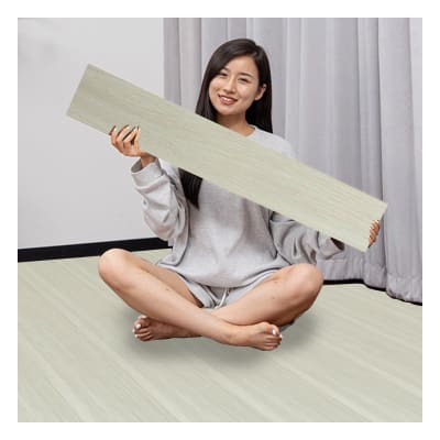 LAMINA DE PISO ADHESIVO PLASTICO 15.2X91.44CM | 36 UNID1