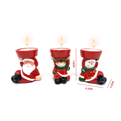 VELA NAVIDAD ACOSTADOS 6.3X5.5X7.8 CM1