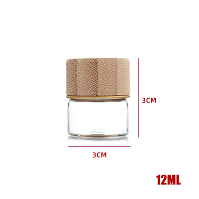 BOTELLA DE VIDRIO CON TAPA DE BAMBÚ 3X3CM1