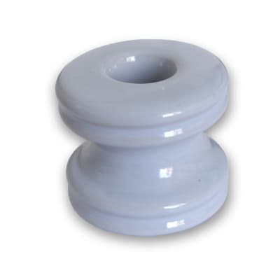 Aislador carrete Porcelana Chico 51x46mm 0.4kV Elexor1