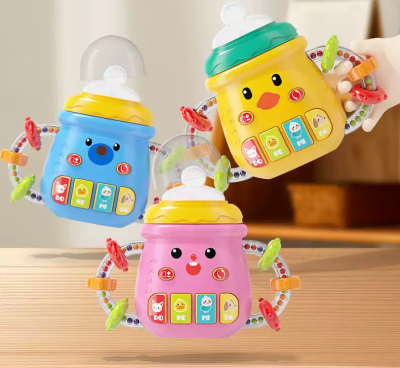 Mamadera musical con luces y sonajeros1