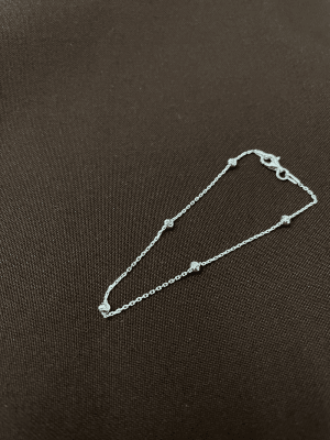 Pulsera tradicional con esferas delgadas1