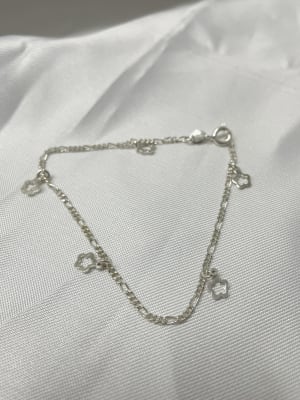 Pulsera cartier con flores colgantes1