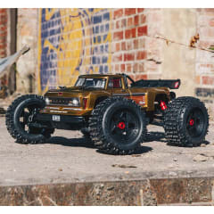Arrma Outcast 4S V2 BLX Brushless RTR 1/10 Stunt Truck (Bronze) w/SLT3 2.4GHz Radio & Smart ESC Arrma Outcast 4S V2 BLX Brushless RTR 1/10 Stunt Truck (Bronze) w/SLT3 2.4GHz Radio & Smart ESC