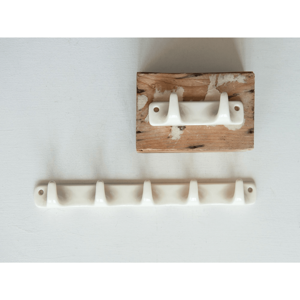 PERCHA CERAMICA BLANCA 2 GANCHOS.2