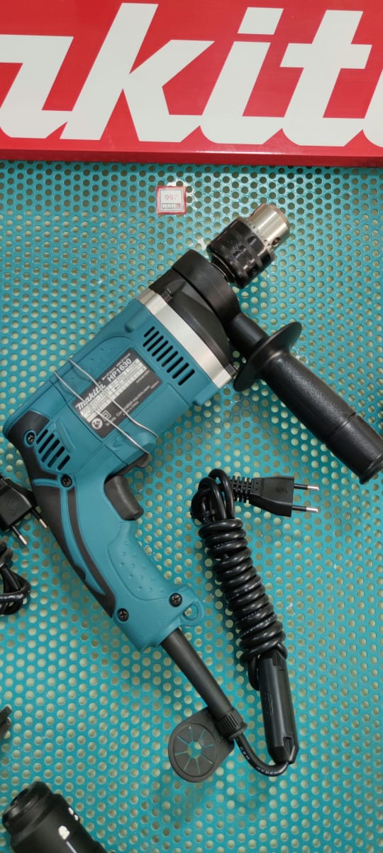 TALADRO DE PERCUSIÓN 13 MM. 710 W. 0-2.200 RPM. REVERSIBLE C/ MALETA - HP1630K. MAKITA.2