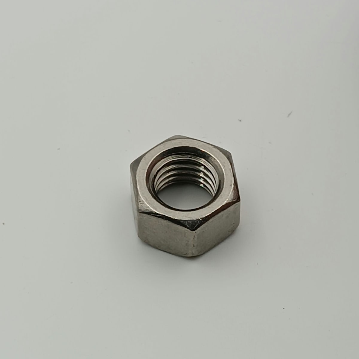 TUERCA HEXAGONAL AISI 304 7/8-9 X 1 5/16 X 3/43