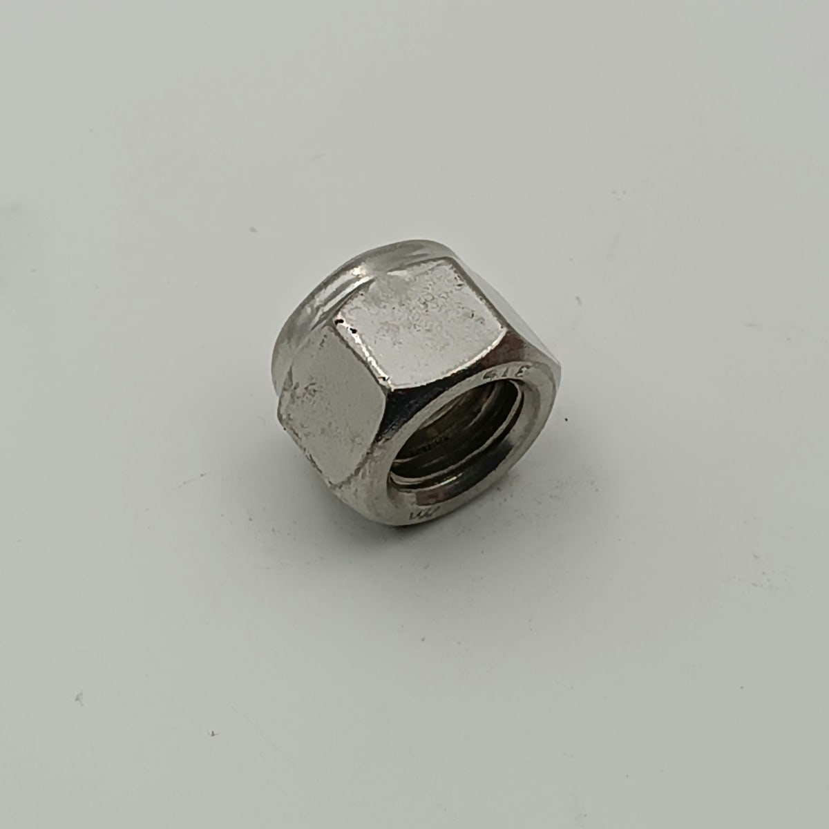TUERCA CON SEGURO NYLON AISI 316 5/8 - 112