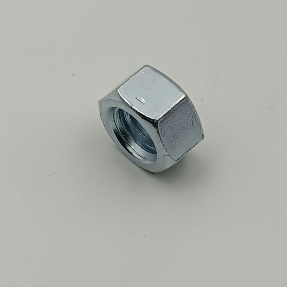 TUERCA HEXAGONAL GRADO 2 CINCADA 1/4 - 202