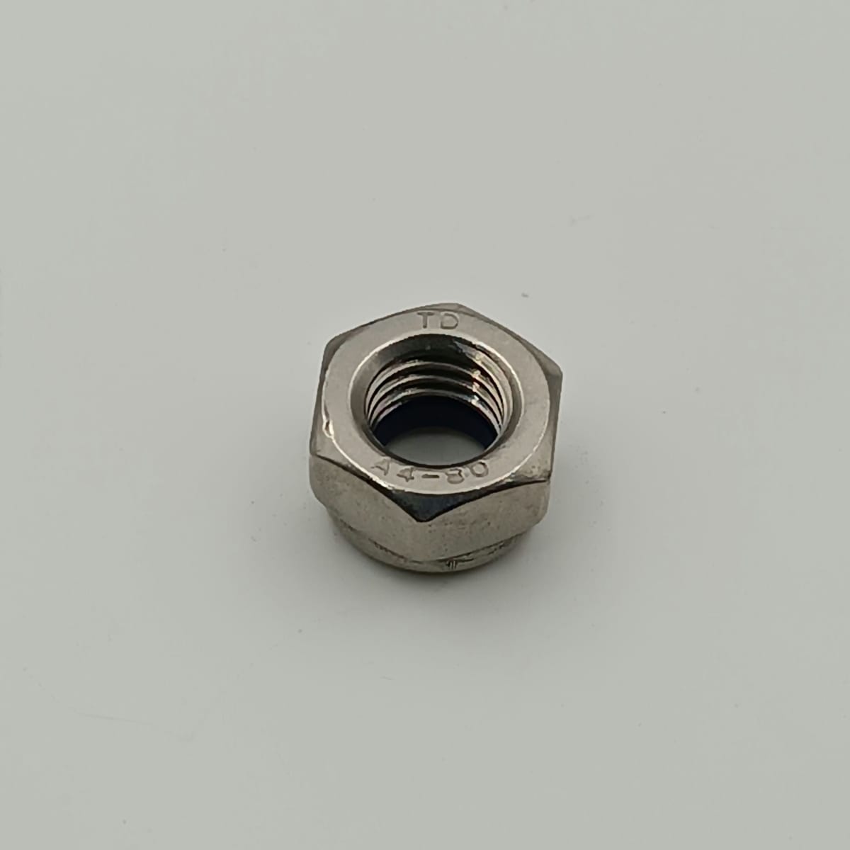TUERCA DIN 985 A4 (316) SEGURO NYLON M6 - 1.00 0