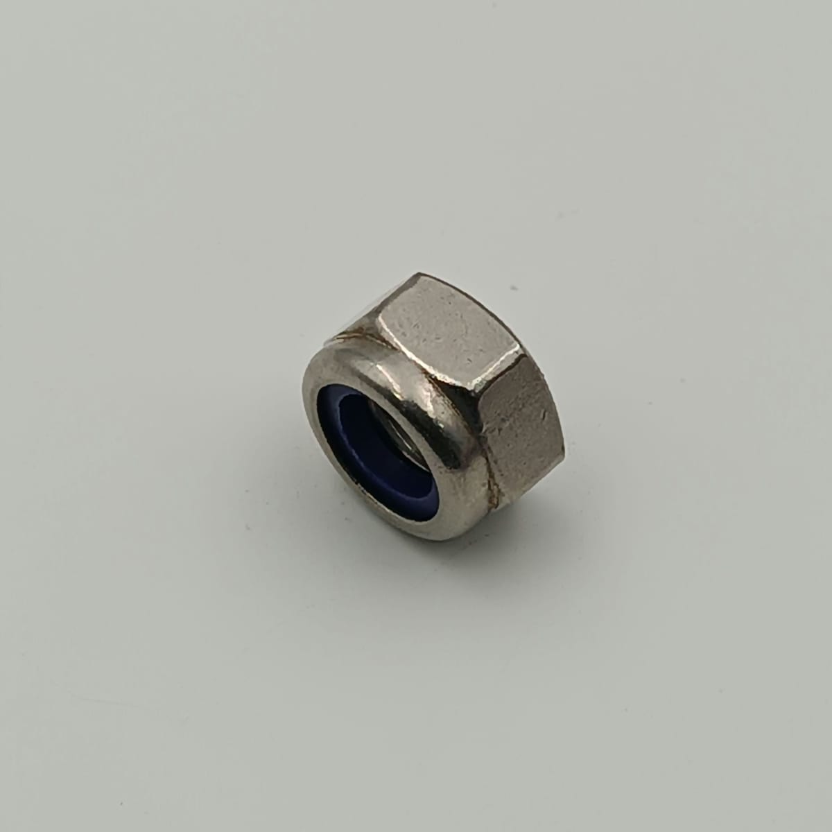 TUERCA DIN 985 A4 (316) SEGURO NYLON M3 - 0.502